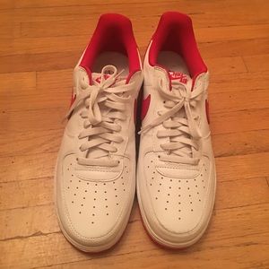 White and red Air Force 1’s